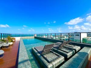 Flat Lindo e Espaçoso com Varanda e Vista Mar