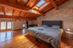 Villas Au coeur de Bruniquel - Magnifique villa en pierres pour 7 personnes - Piscine privee - Poele - Vue imprenable sur le village - Jardin - Garage : photos des chambres