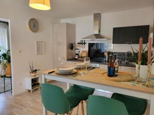 Appartements Le Guelef - Appartement 2 personnes : photos des chambres