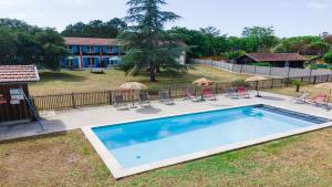 Appartements Domaine du Flamand - Gites du Flamand cote Piscine : Appartement