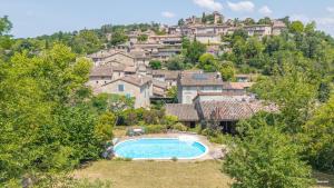 Villas Au coeur de Bruniquel - Magnifique villa en pierres pour 7 personnes - Piscine privee - Poele - Vue imprenable sur le village - Jardin - Garage : photos des chambres