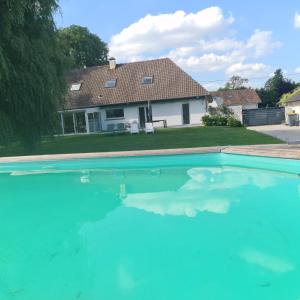 Maisons de vacances Echappee belle a la campagne avec piscine : photos des chambres