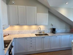 Taklägenhet med balkong