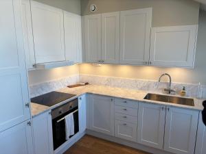 Taklägenhet med balkong