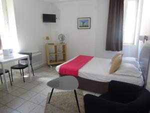 Appart'hotels Residence Les Cordeliers : photos des chambres