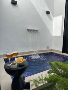 Casa Rural con piscina privada en casco urbano de Náquera Botigueta 25