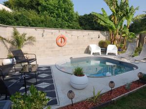 Villas maison, trois chambres,jardin,piscine : photos des chambres