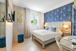 Hotels Logis Hotel l'Amandier : photos des chambres