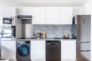 Appartements GuestReady - Sky-high serenity steps from Paris : photos des chambres