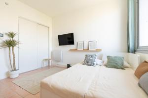 Appartements Nemausus YourHostHelper : photos des chambres