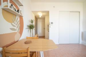 Appartements Nemausus YourHostHelper : photos des chambres