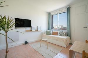 Appartements Nemausus YourHostHelper : photos des chambres