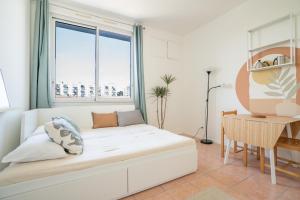 Appartements Nemausus YourHostHelper : photos des chambres