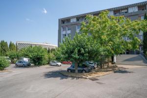 Appartements Nemausus YourHostHelper : photos des chambres