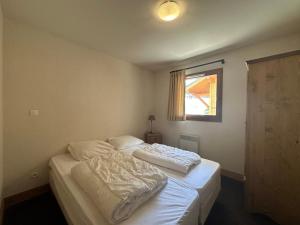 Appartement spacieux 4 chambres, pieds pistes, parking inclus - FR-1-642-4