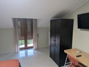 Camera Quadrupla con Bagno in Comune