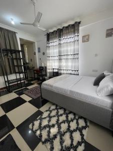 Studio apartment Mwenge