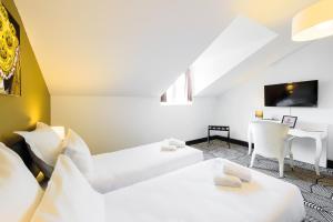 Appart'hotels Appart'City Collection Nimes Arenes : photos des chambres