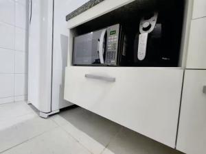 Imóvel na praia com dois quartos climatizados