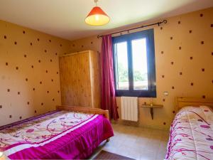 Maisons de vacances Charmante maison en pierre au coeur du Perigord Noir avec jardin, cheminee et equipements pour bebe - FR-1-616-100 : photos des chambres