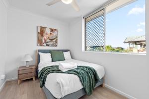 Comfy 2BR Near Hospitals, QUT and CBD with Parking!