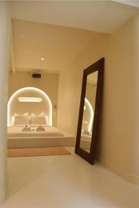 Appartements Casa Cinta Evasion Balinaise avec Baignoire Spa : photos des chambres