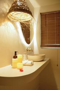 Appartements Casa Cinta Evasion Balinaise avec Baignoire Spa : photos des chambres