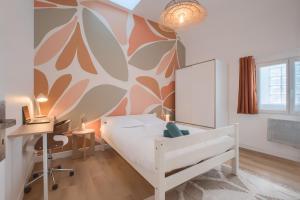 Appartements La Douceur - Wifi - Proche centre-ville : photos des chambres