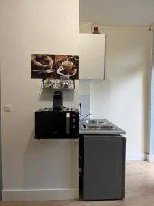 Appartements spacieux appartement Paris Gambetta : photos des chambres