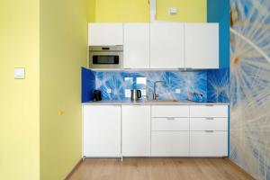 Colorful Apartment Rataje Poznań with Parking and Air Conditioning by Noclegi Renters