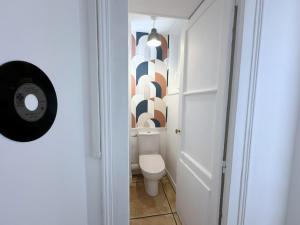 Le Seventys, T3 vintage avec jardin