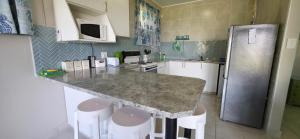 Calamari 9 - 6 Sleeper - 30 Steps From The Beach!