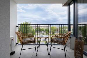 Prandoty 10C Cozy Apartment with Balcony & Parking in Krakow by Noclegi Renters