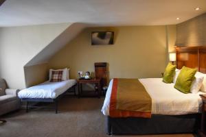 Family Room room in The Tontine Hotel
