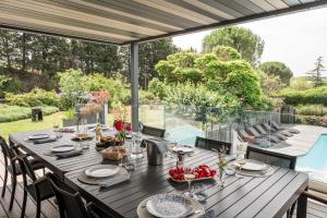 Maisons de vacances L'ecrin de la Cite, Coeur de Vignes - Vivez une experience inoubliable ! : photos des chambres