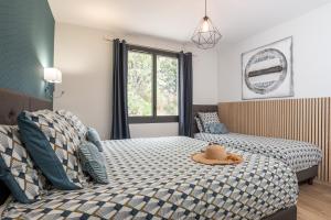 Maisons de vacances L'ecrin de la Cite, Coeur de Vignes - Vivez une experience inoubliable ! : photos des chambres