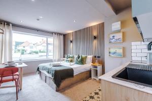 Stylish 1BR Studio with Luxury Finishes