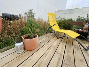 Appartements Petit coin de paradis avec jardin : photos des chambres