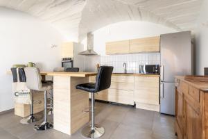 Maisons de vacances Gite au calme avec lits queen size proche Clermont a Chanat La Mouteyre : photos des chambres