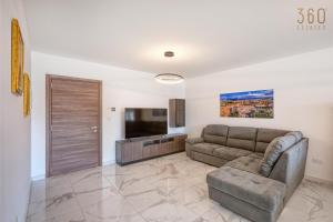 Seaside Comfort in Marsascala, 2BR with Balcony by 360 Estates