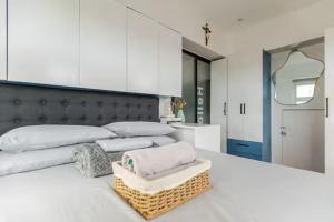 Balai ni Boss - Cozy Modern 1BR in Victoria Sports Tower