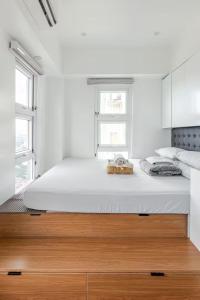 Balai ni Boss - Cozy Modern 1BR in Victoria Sports Tower