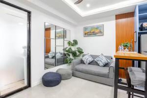 Balai ni Boss - Cozy Modern 1BR in Victoria Sports Tower