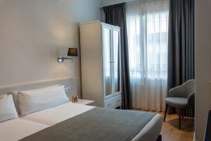 Twin Room room in Mesón Castilla Atiram Hotels