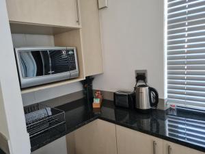 Cozy Unit 26 , Genesis on Fairmount