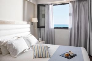 Deluxe One-Bedroom Suite with Sea View room in Ammos Suites