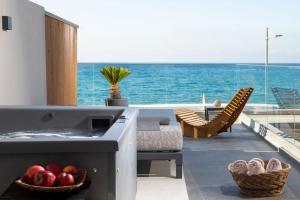 Superior Family Suite Sea View with Outdoor Jacuzzi room in Ammos Suites