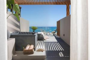Deluxe Suite Sea View with Outdoor Jacuzzi room in Ammos Suites