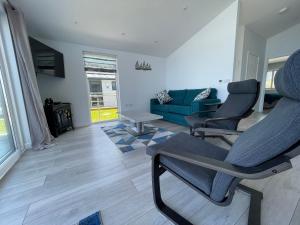 15 Golden Bay Holiday Village - Coastal Retreat with Breathtaking Views