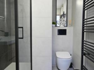 Studio rénové vue mer latéral & parking à Westende by La Conciergerie